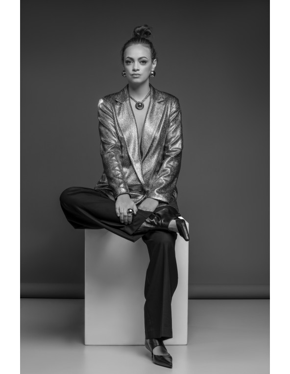 Gold-plated stainless steel double-chain necklace with decorative half-sphere pendant.