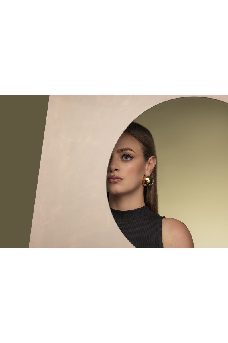 Light gold-plated stainless steel half-sphere earrings in shiny finish.