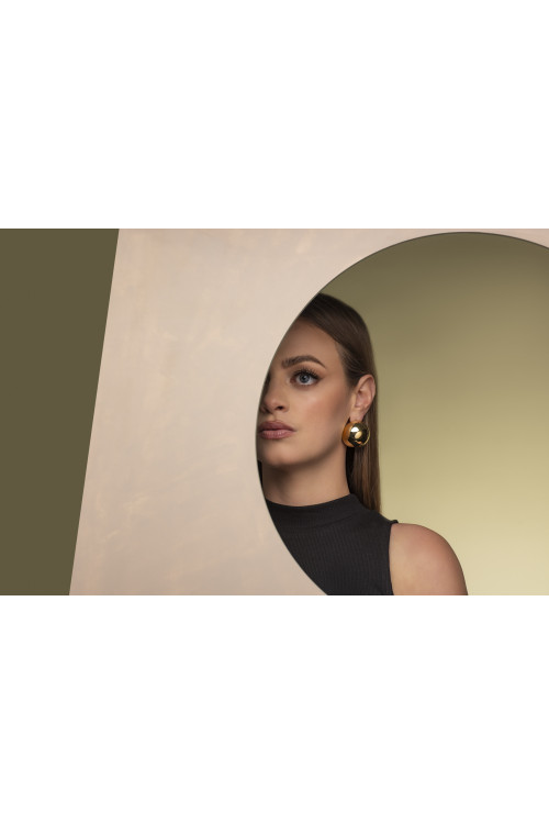 Light gold-plated stainless steel half-sphere earrings in shiny finish.