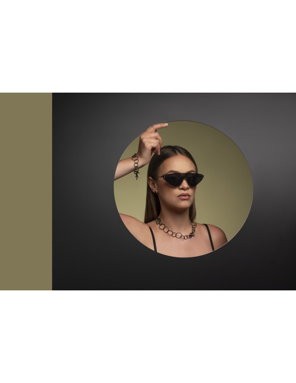 Black matte stainless steel bracelet with movable elements in a modern minimalist style.