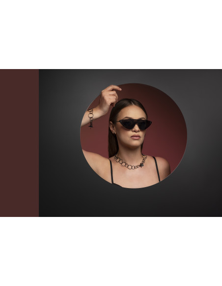 Black matte stainless steel bracelet with movable elements in a modern minimalist style.