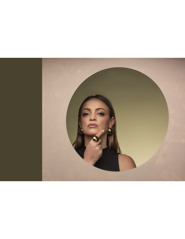 Gold ring with large half-sphere made of stainless steel