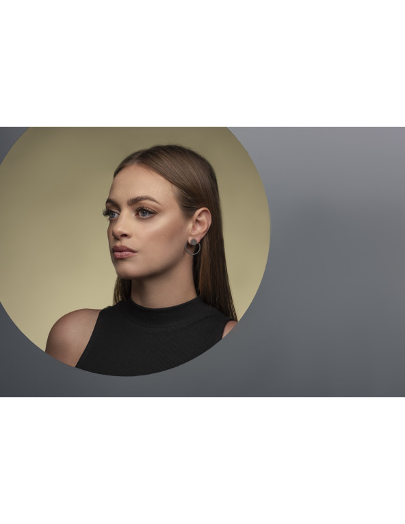 3-in-1 matte black stainless steel earring set with open and closed circle design.