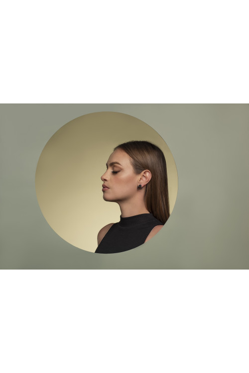 2-in-1 matte black stainless steel earrings featuring open and closed circle design.