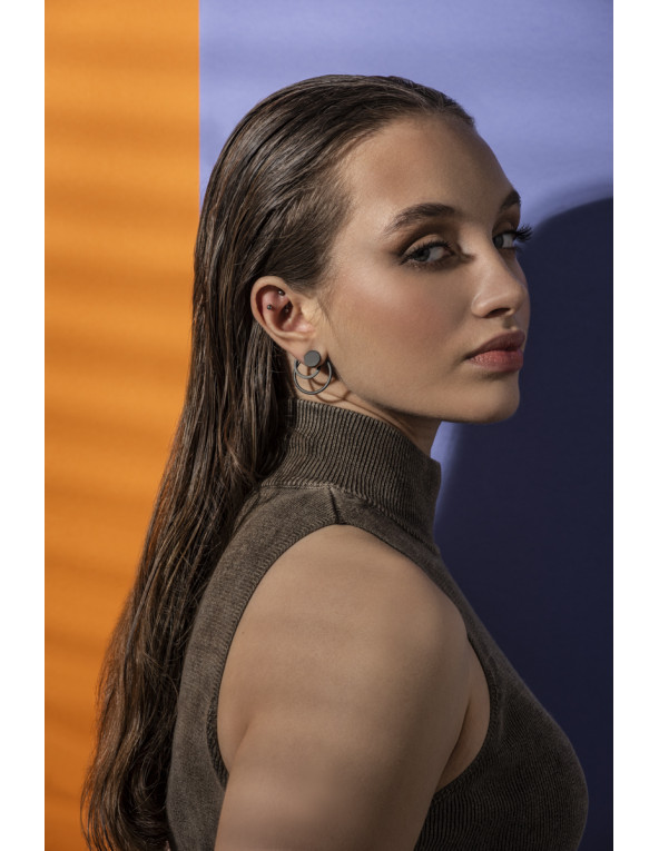 3-in-1 matte black stainless steel earring set with open and closed circle design.