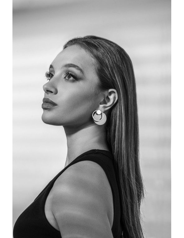 2-in-1 stainless steel earring set in silver.