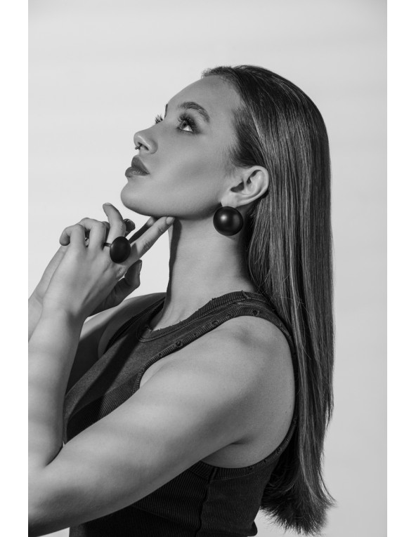 Lightweight black stainless steel half sphere earrings in matte finish.