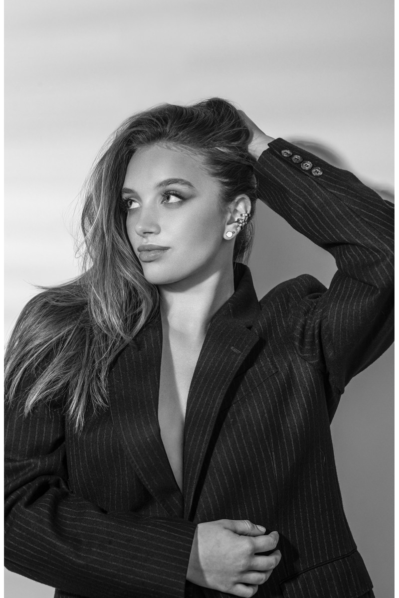 Silver stainless steel disc earrings with a minimalist round shape.