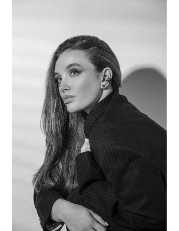 Matte black stainless steel disc earrings with a minimalist round design.