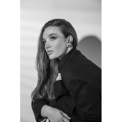 Matte black 2 mm stainless steel ball stud earrings with minimalist round design. 2