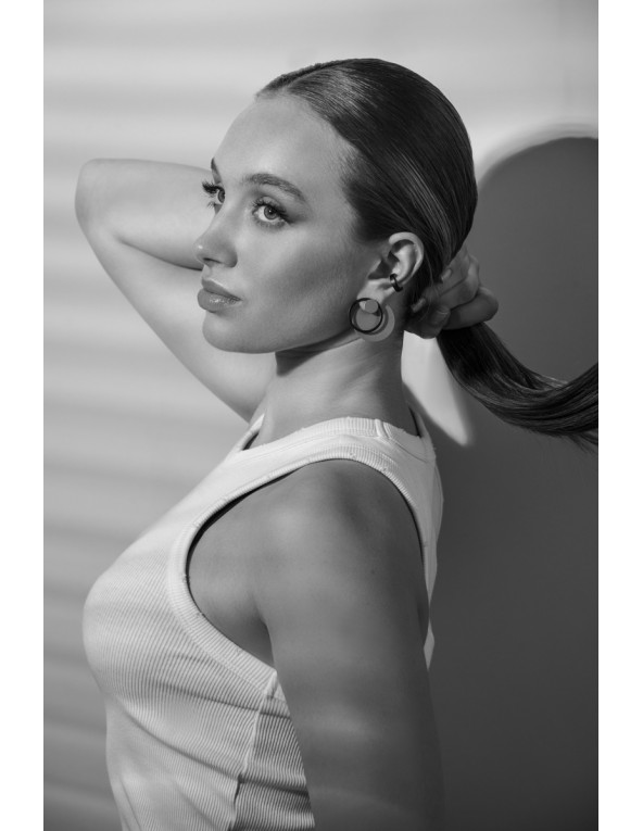 Matte black 2.5 mm stainless steel ear cuff with minimalist finish.