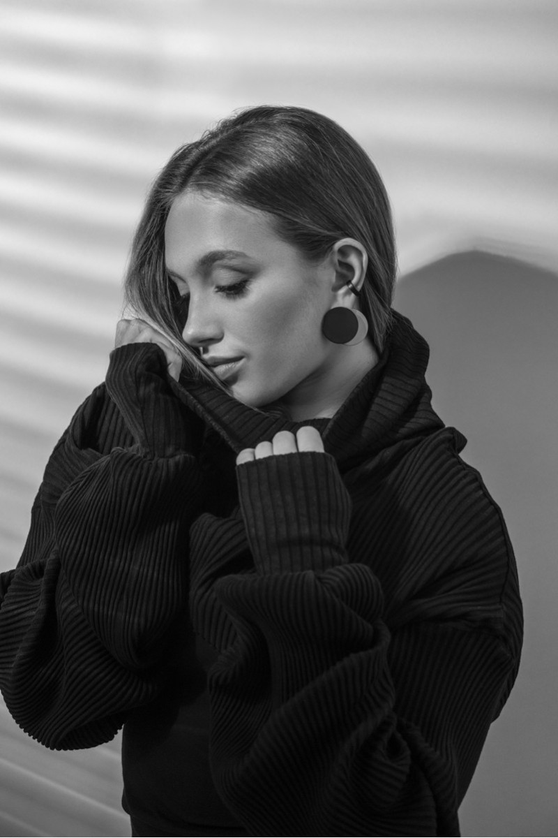 Matte black 4.1 mm stainless steel ear cuff with modern finish.