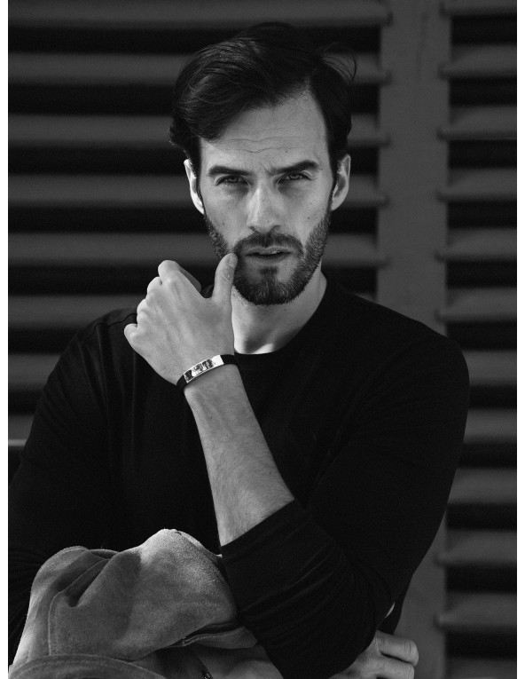 Men’s brown leather bracelet with matte gold steel plate and watch-style clasp.