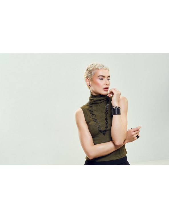 Wide black leather bracelet with glossy stainless steel clasp