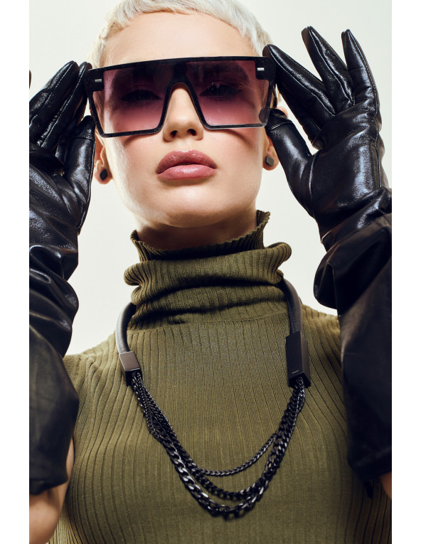 Original necklace made of leather and black matte stainless steel in a modern style