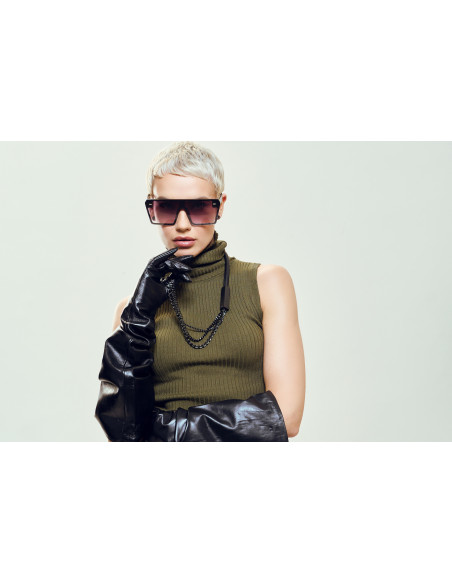 Original necklace made of leather and black matte stainless steel in a modern style