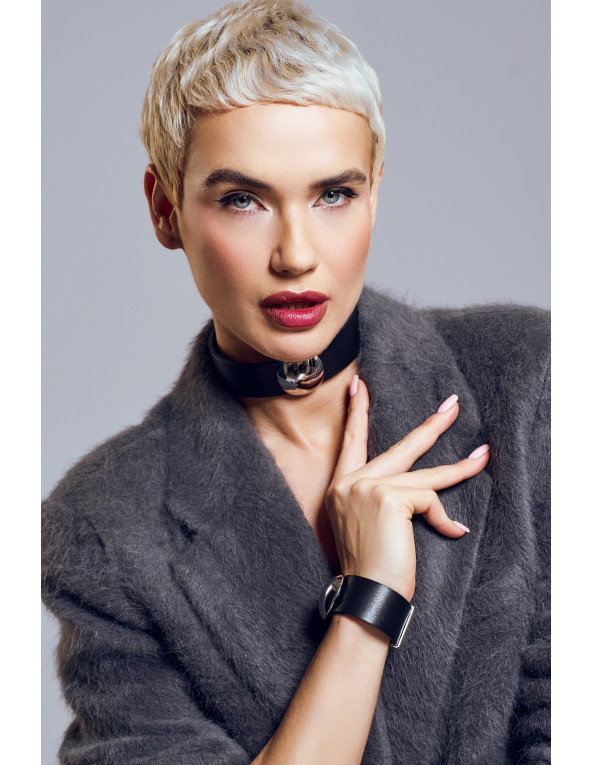 Black leather bracelet with wide polished steel element and classic design