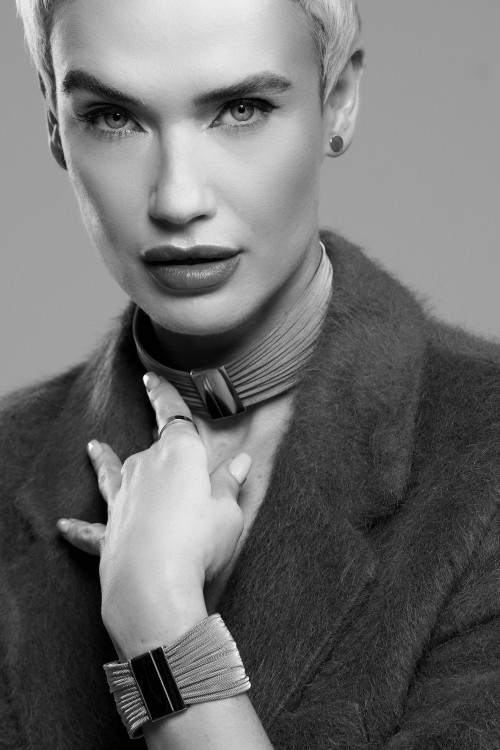 Silver stainless steel disc earrings with a minimalist round shape.