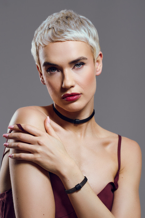 Black matte stainless steel choker necklace with a refined minimalist finish. 2