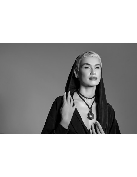 Silver stainless steel hoop earrings with stud closure.