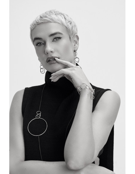 Long silver hoop earrings made of stainless steel and sterling silver