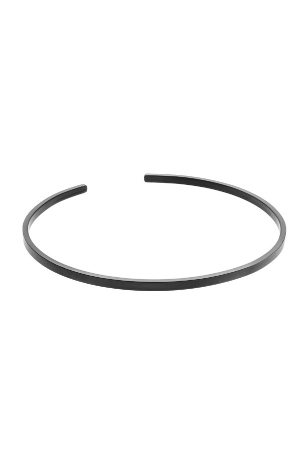 Black matte stainless steel arm cuff with sleek geometric design