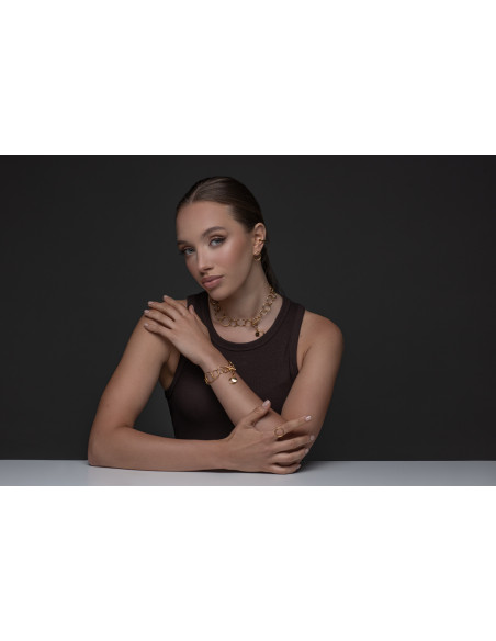 Gold-plated stainless steel bracelet with movable elements in an elegant minimalist style