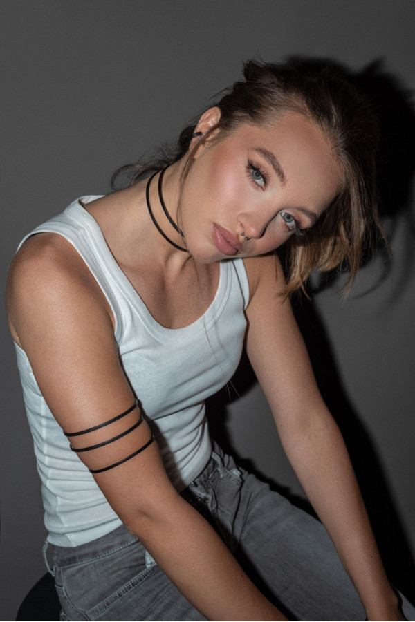 Black matte stainless steel arm cuff with sleek geometric design 2