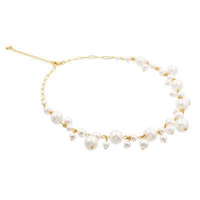 Gold-plated shell pearl necklace displayed with elegant packaging