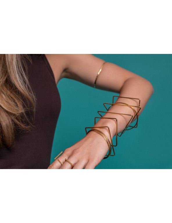 Gold delicate stainless steel bangle bracelet with minimalist elegant design