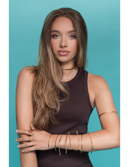 Gold delicate stainless steel bangle bracelet with minimalist elegant design