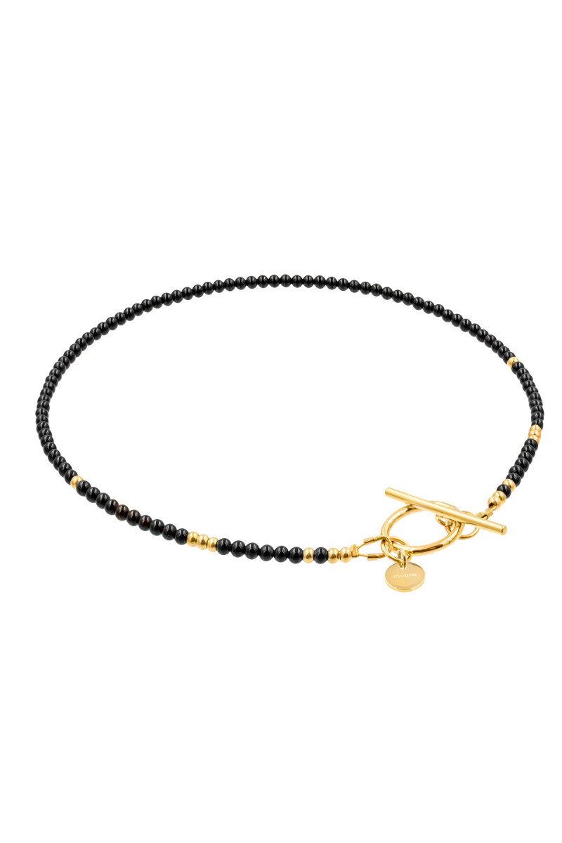 Delicate necklace made of onyx and gold beads