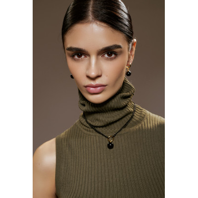 Gold-plated silver earrings with large black onyx stones. 2