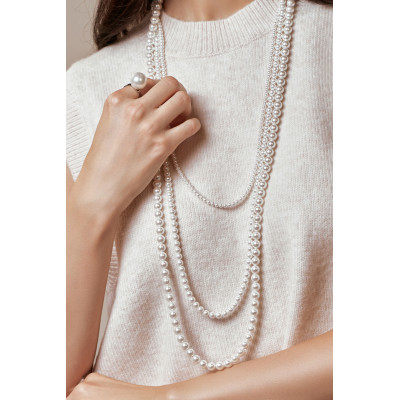 Gold-plated ring with a large shell pearl on a gold band