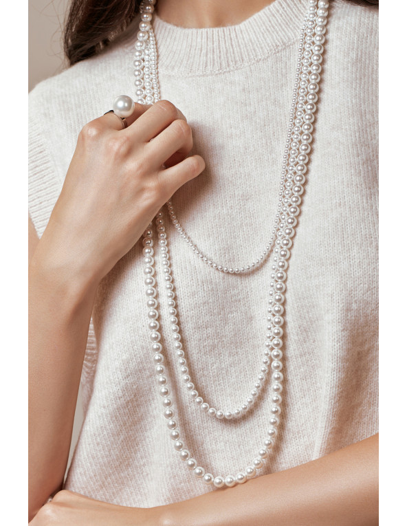 Gold-plated ring with a large shell pearl on a gold band