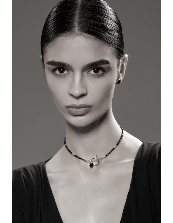 Delicate necklace with onyx stones and silver...