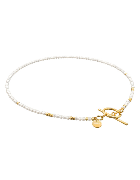 A delicate necklace made of shell pearls and...