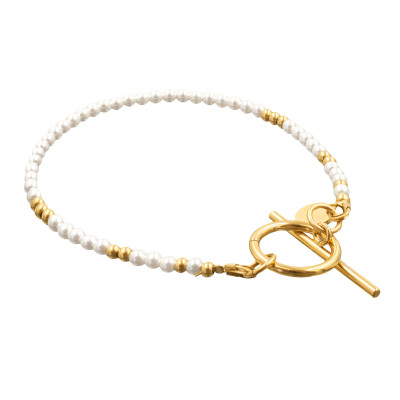 Subtelna bransoleta z pereł shell i pozłacanej stali...
