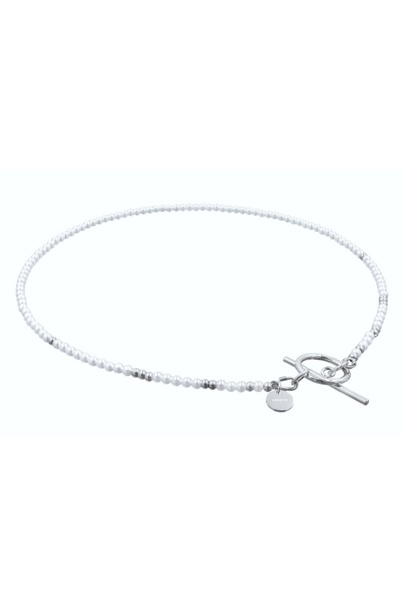 A delicate necklace made of shell pearls and...