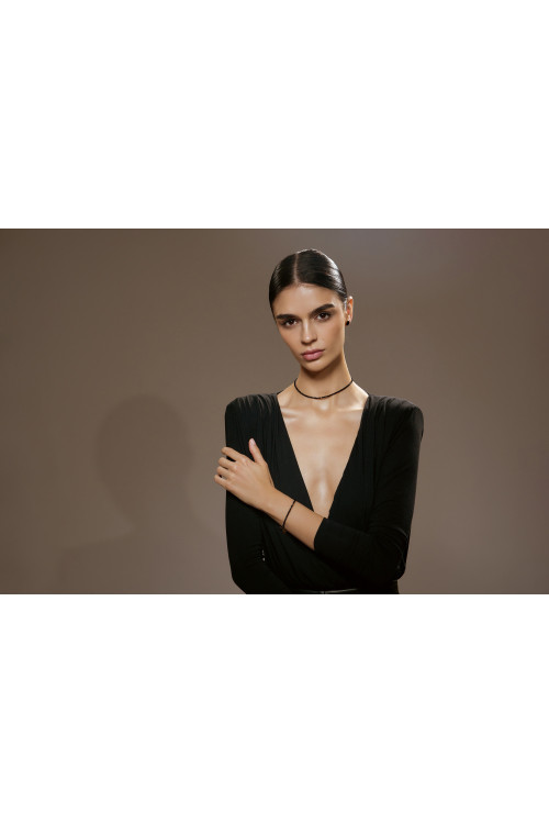 Delicate bracelet made of onyx stones and decorative beads