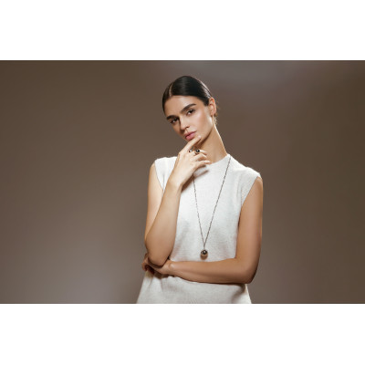 Long silver stainless steel necklace with large decorative sphere. 2