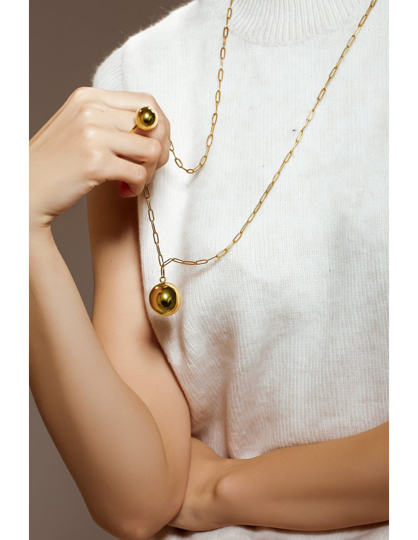 Long gold-plated stainless steel necklace with large decorative sphere.