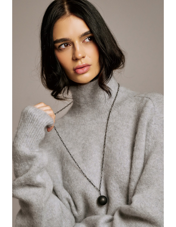 Long necklace in black matte stainless steel featuring a large decorative sphere.