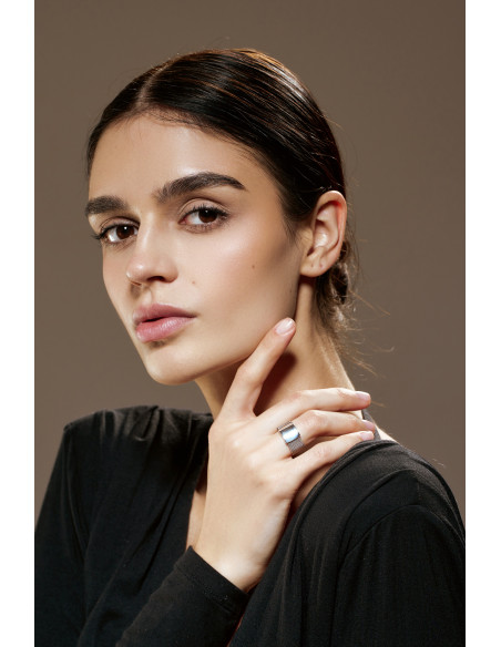 Modern ring made of stainless steel mesh and silver 925