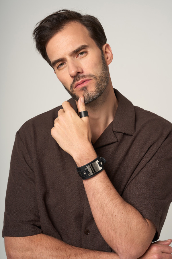 Wide matte black stainless steel ring. 2