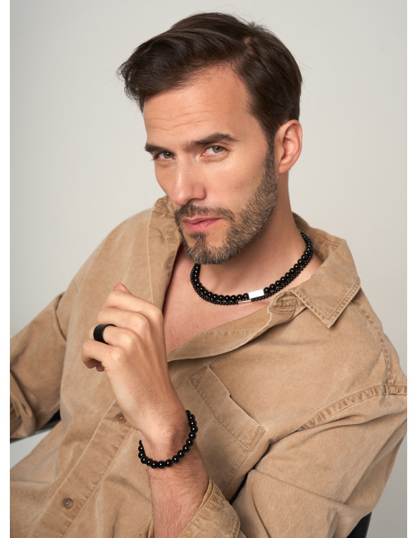 Bracelet on rubber band with natural stones onyx