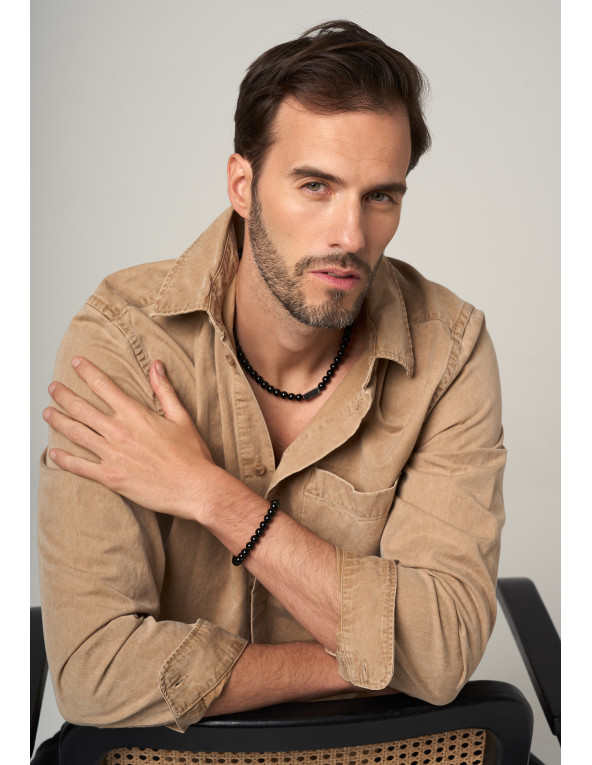 Bracelet on rubber band with natural stones onyx