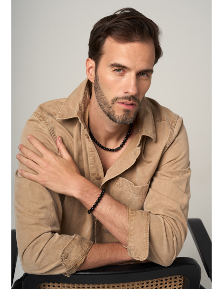 Bracelet on rubber band with natural stones onyx