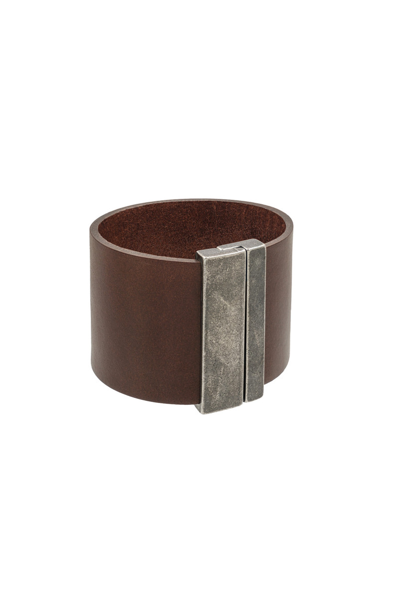 A wide brown leather bracelet with a magnetic clasp