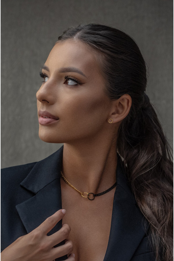 Delicate gold-plated stainless steel necklace in gold and matte black tones. 2